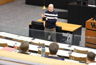 Faculty member teaching in a classroom.