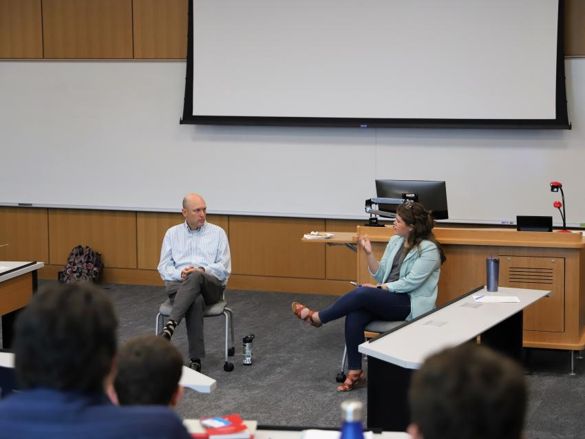 Law student talking to Professor Josh Douglas